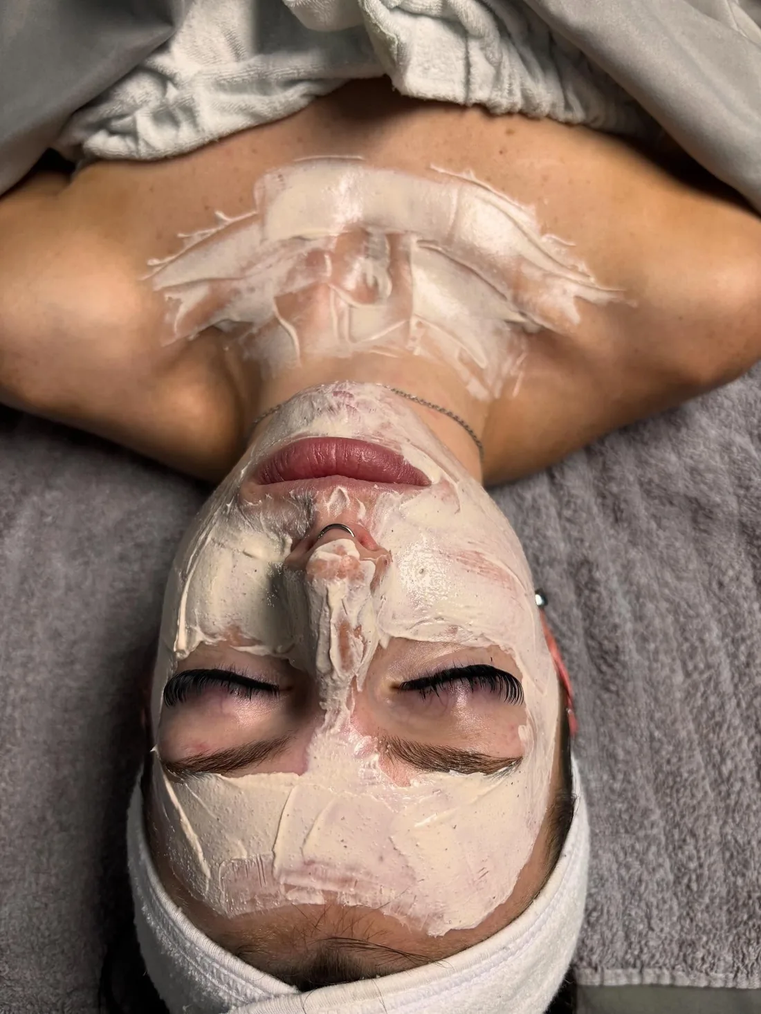 Hydrating mask being applied during a facial at Rosemary Esthetics